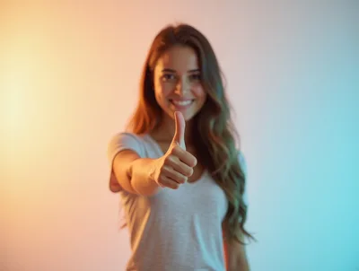 Young Woman Giving A Thumbs Up Gesture