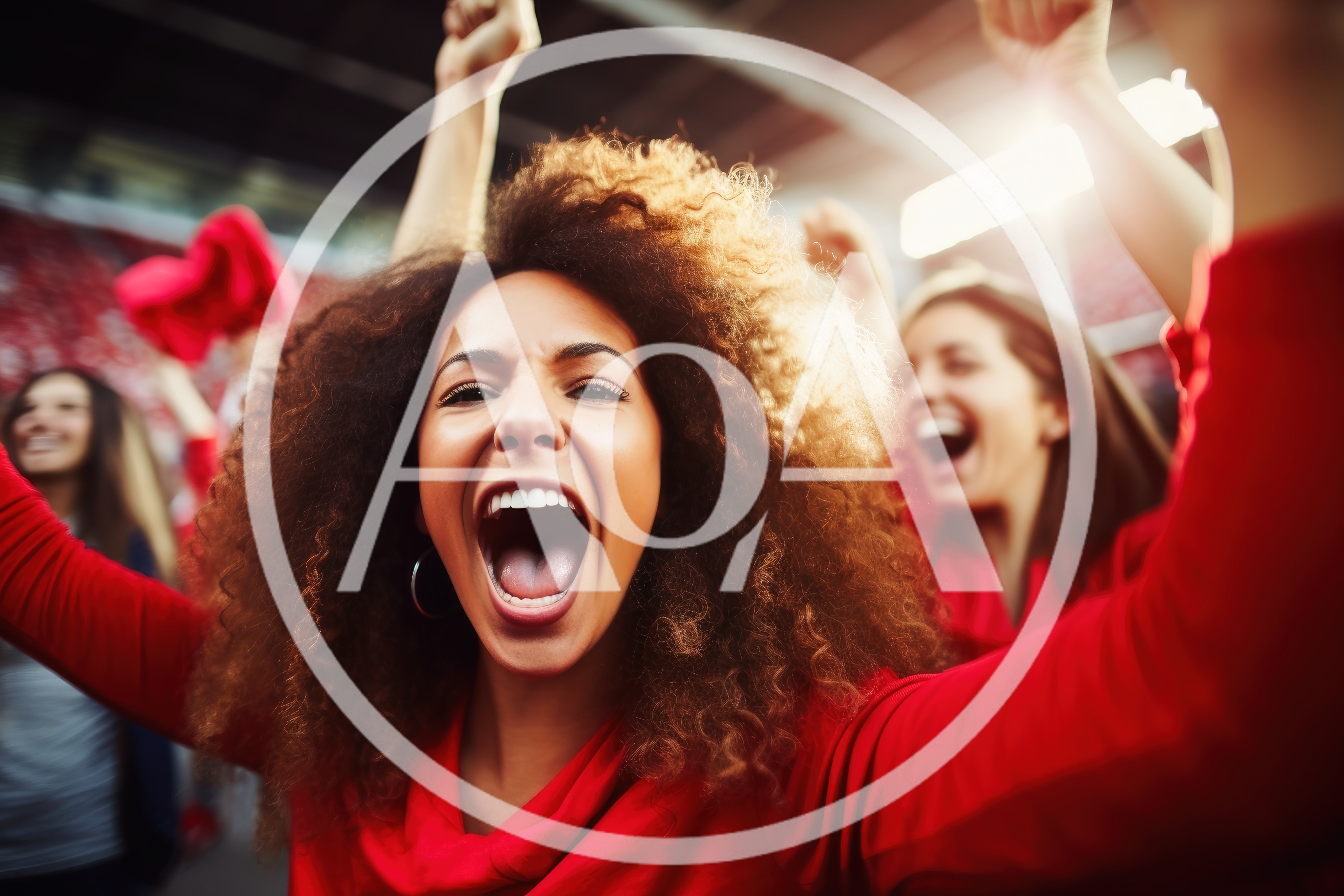 Excited Female Fans Cheering At A Sports Stadium