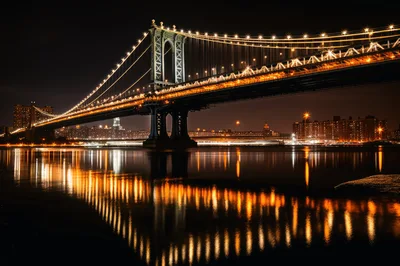 Manhattan Bridge Illuminated At Night Over East River