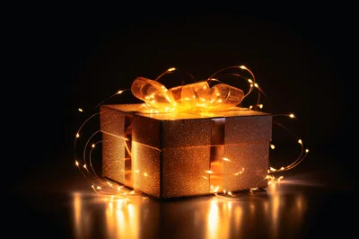 Golden Gift Box Wrapped With Glowing Fairy Lights