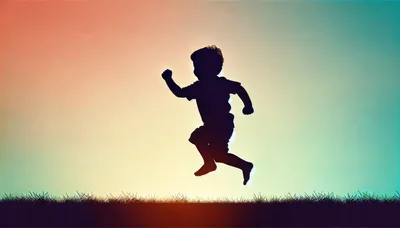 Silhouette of a Young Child Jumping Outdoors