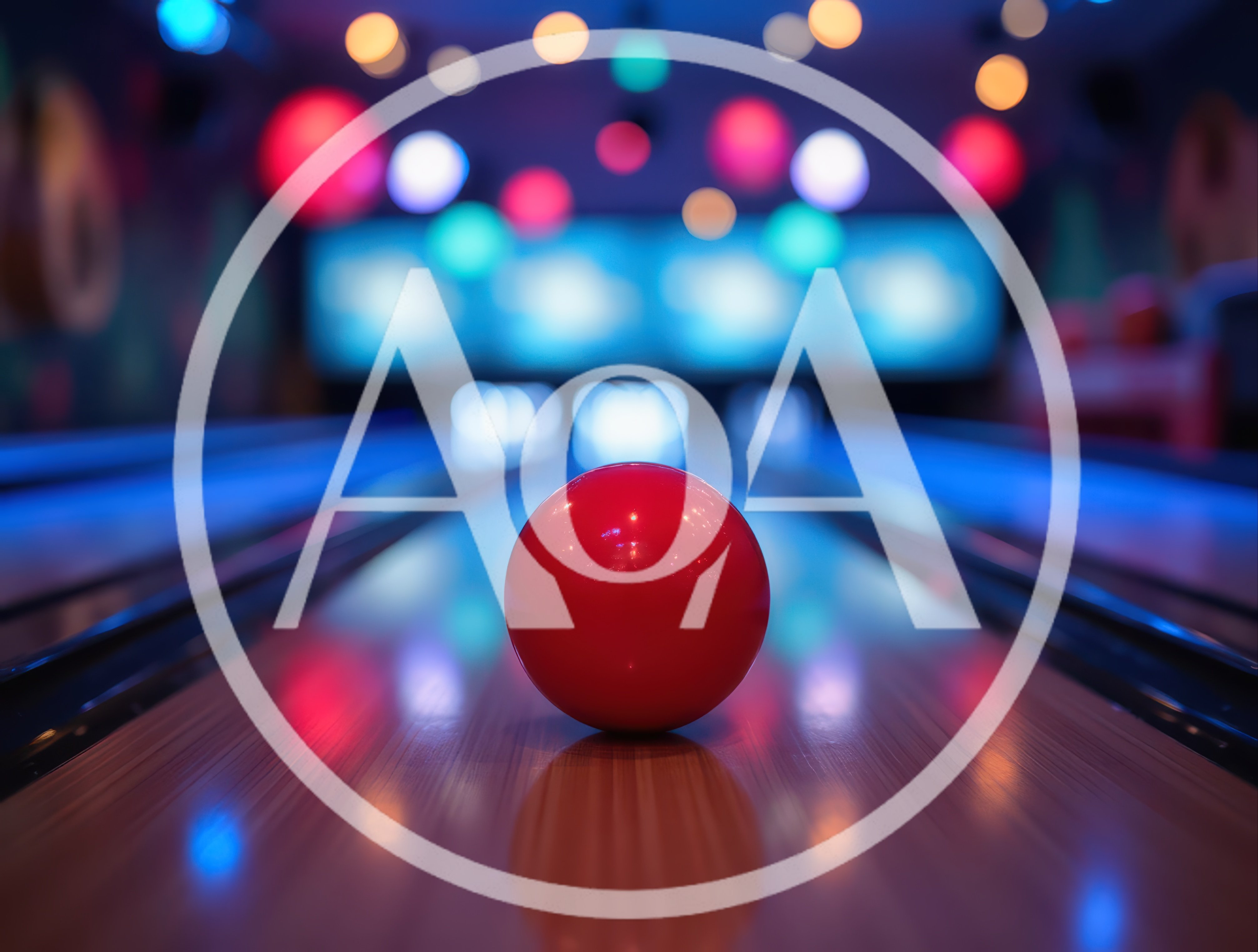 Red Bowling Ball Resting On A Polished Lane