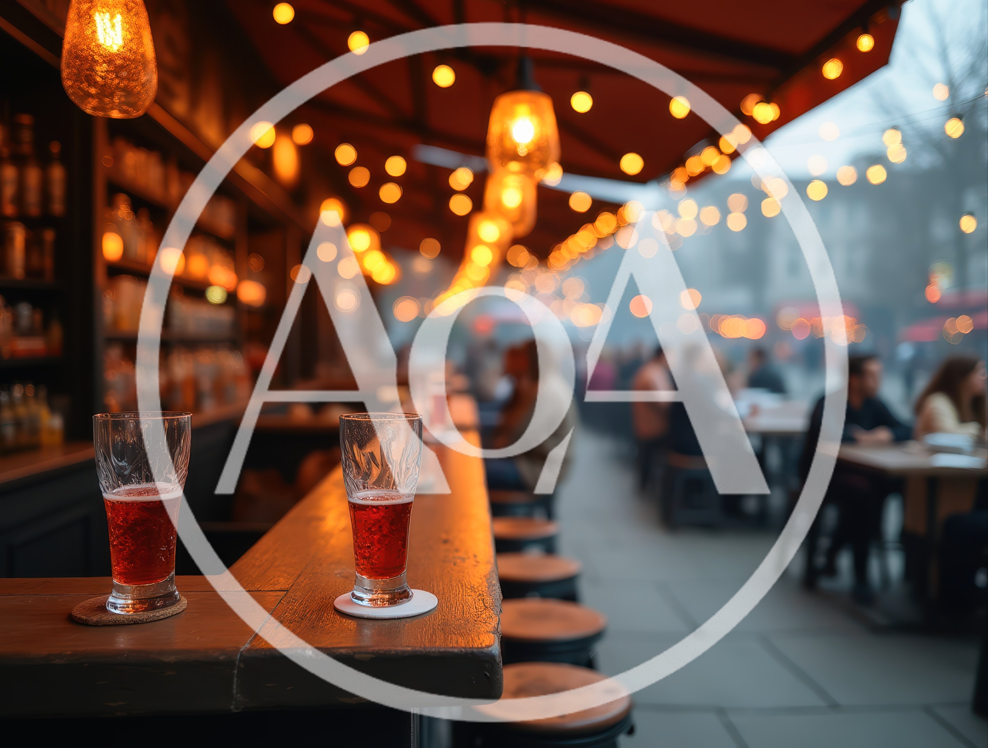 Two Glasses Of Red Beer On A Bar Counter
