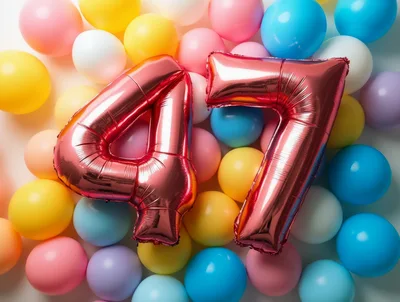 Red Foil Number 47 Balloons on Colorful Background