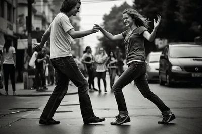 Young Couple Dancing Joyfully On City Street