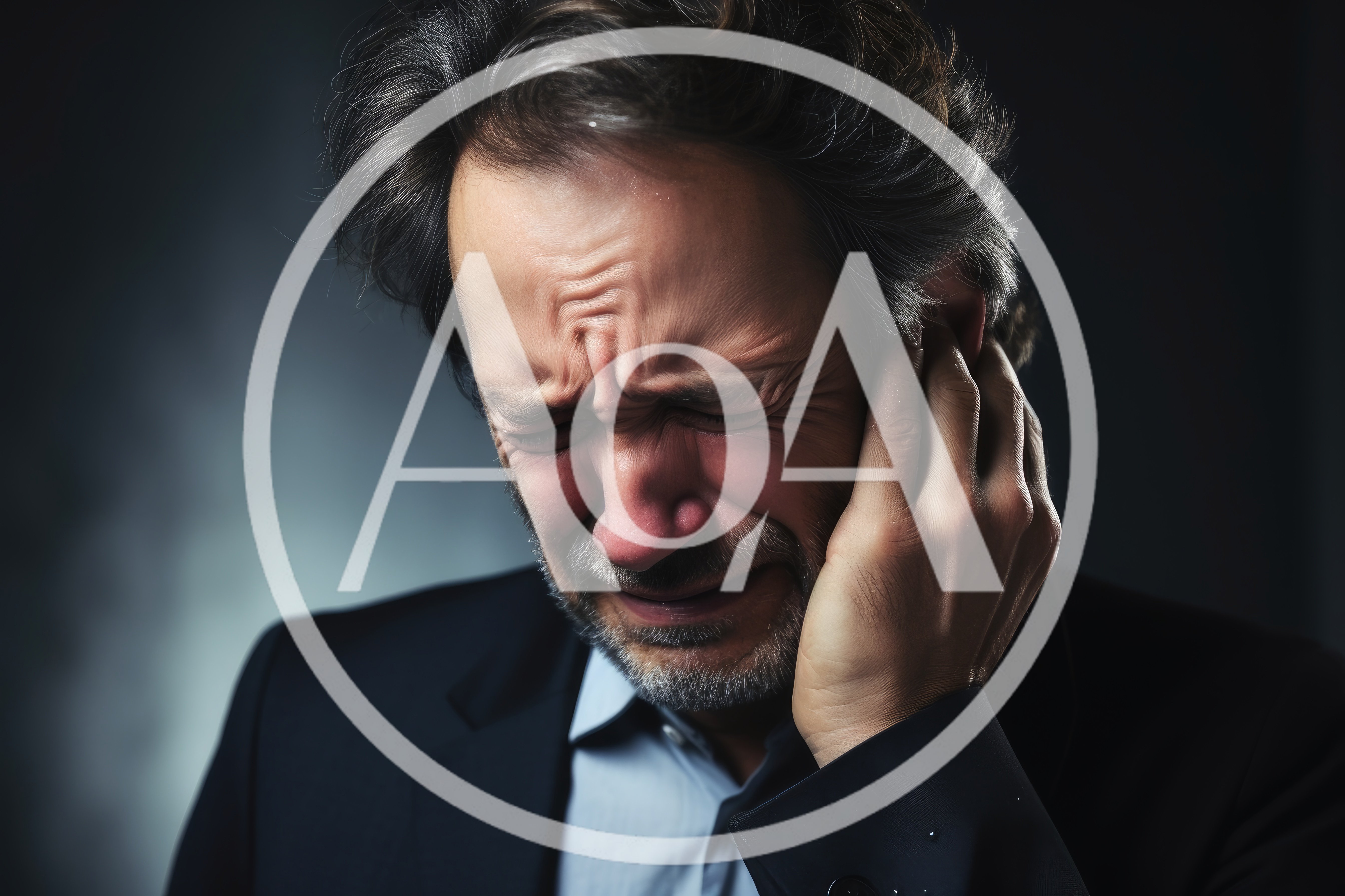 Distressed Middle Aged Businessman Crying In Pain