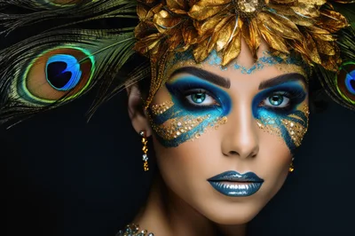 Portrait Of A Woman With Peacock Inspired Makeup