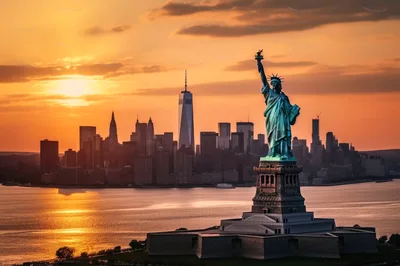 Statue Of Liberty And New York City Skyline Sunset
