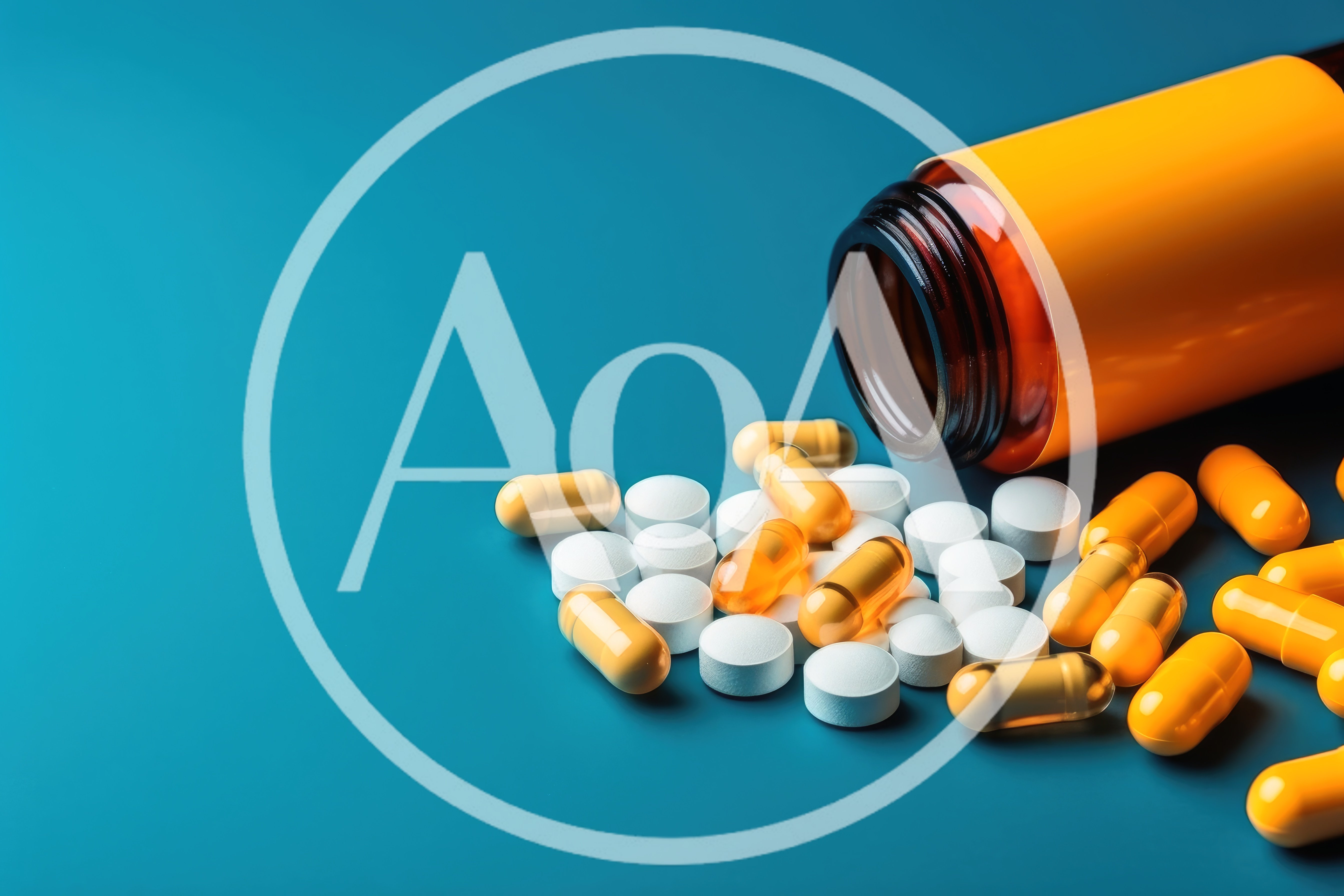 Pills and Capsules Spilled from an Orange Bottle