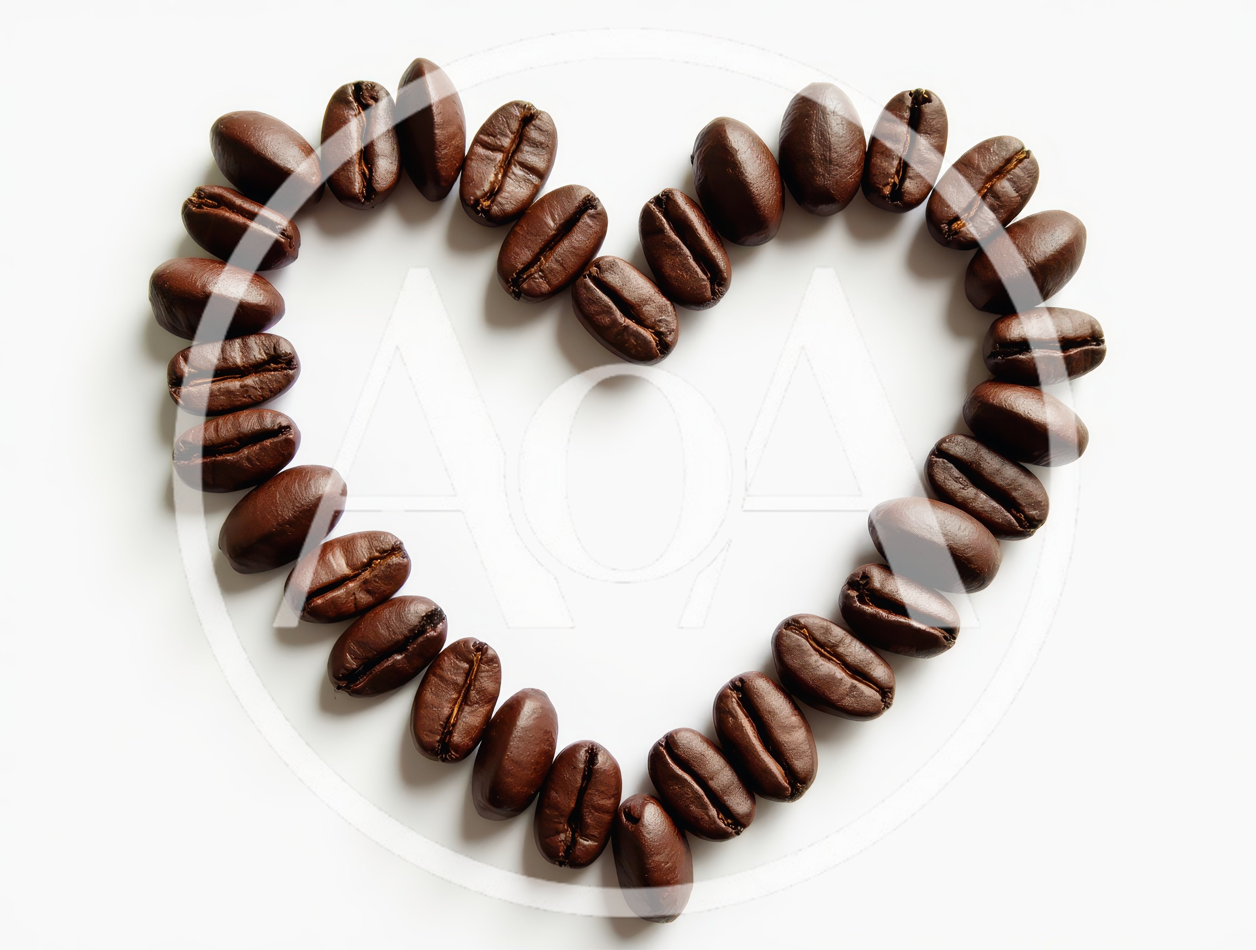 Coffee Beans Arranged In A Heart Shape