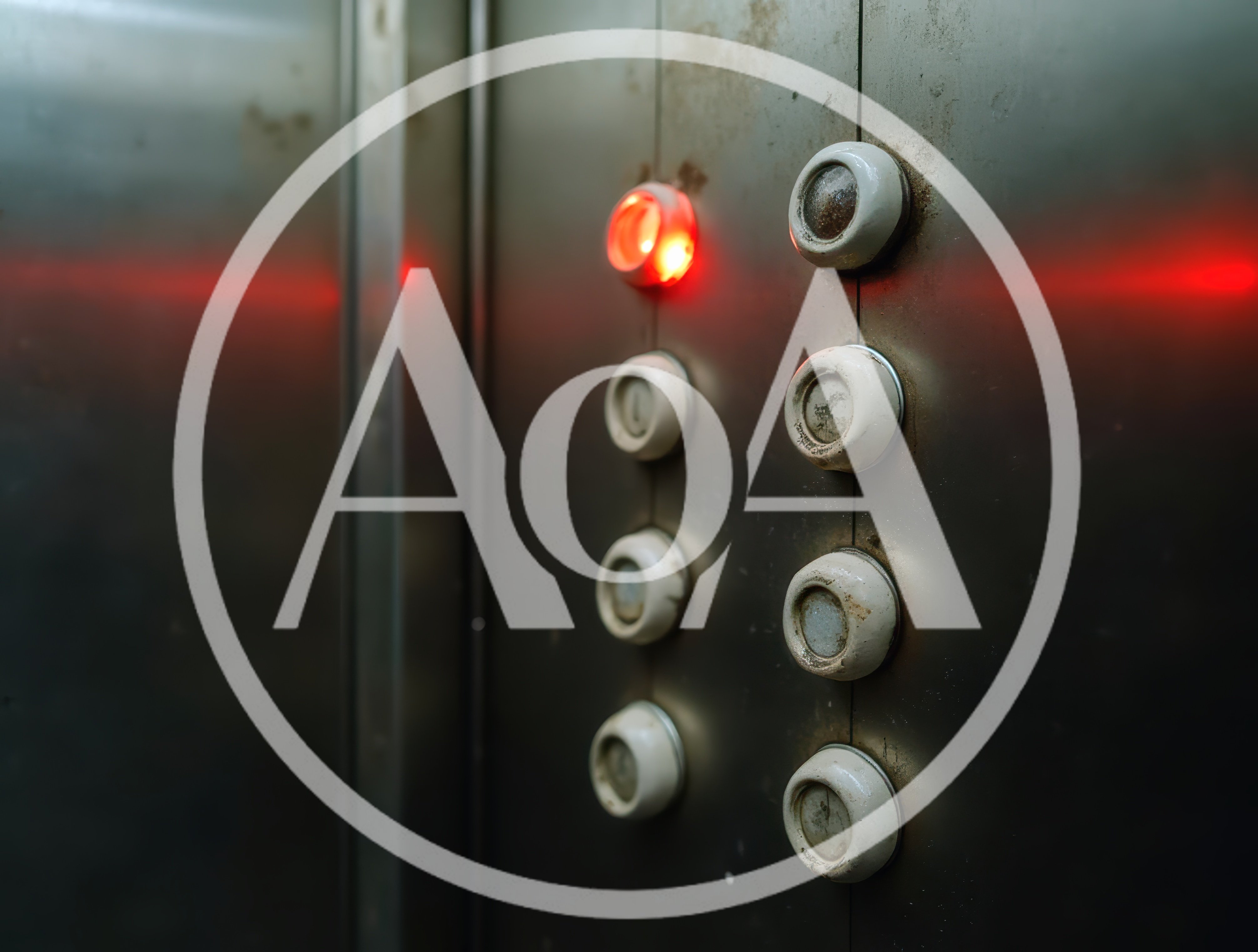 Old Elevator Control Panel With Illuminated Button
