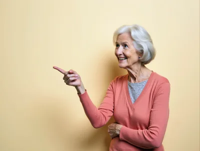 Smiling Senior Woman Pointing To The Side
