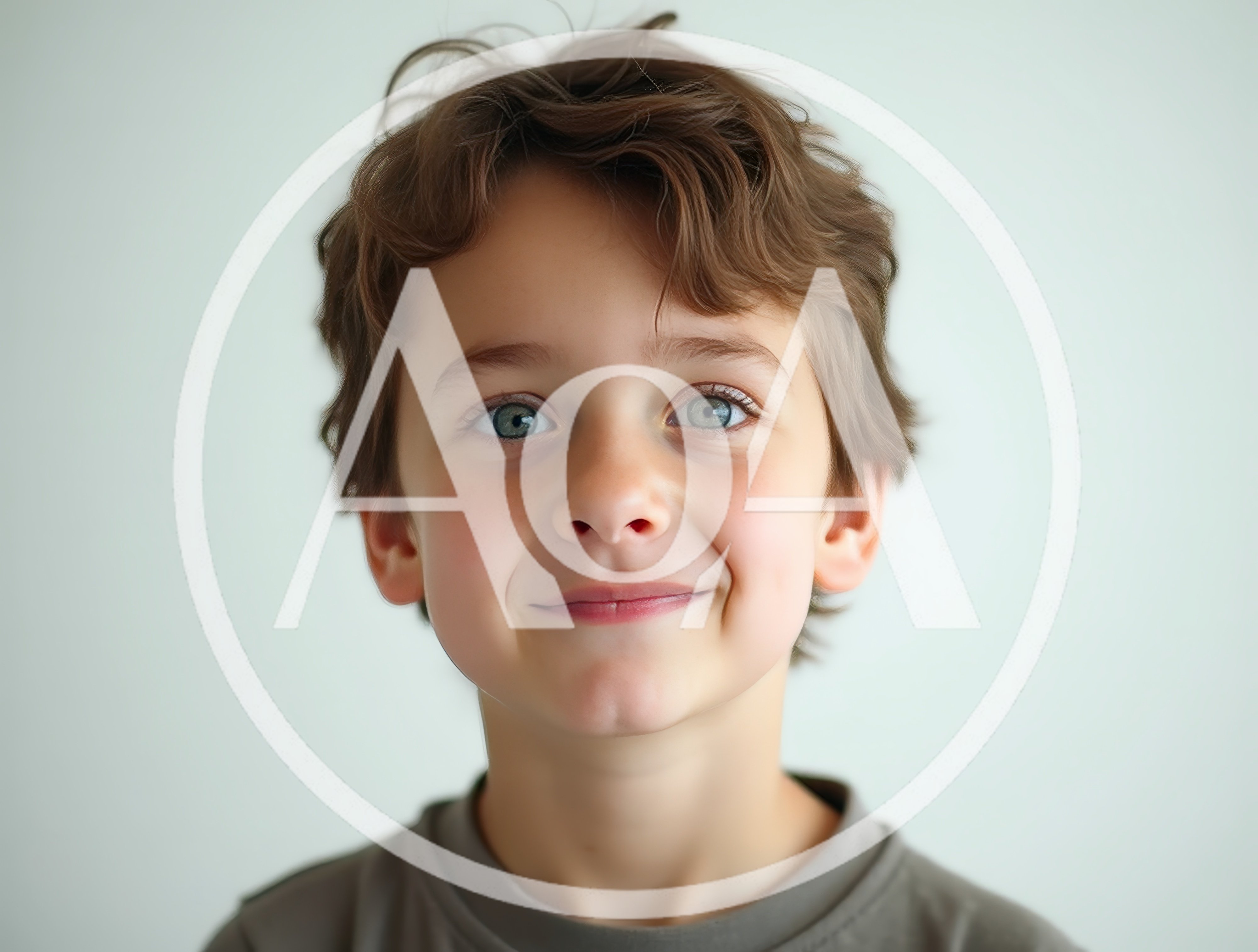 Portrait Of A Young Boy Smiling At Camera