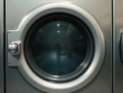 Close Up Of A Commercial Laundry Dryer Door