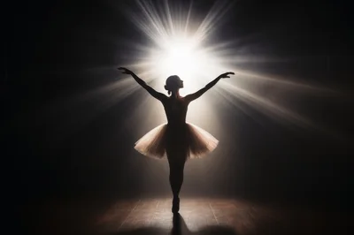 Ballerina Performing Silhouette Under Dramatic Stage Spotlight