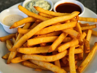 Golden Crispy French Fries With Assorted Dipping Sauces