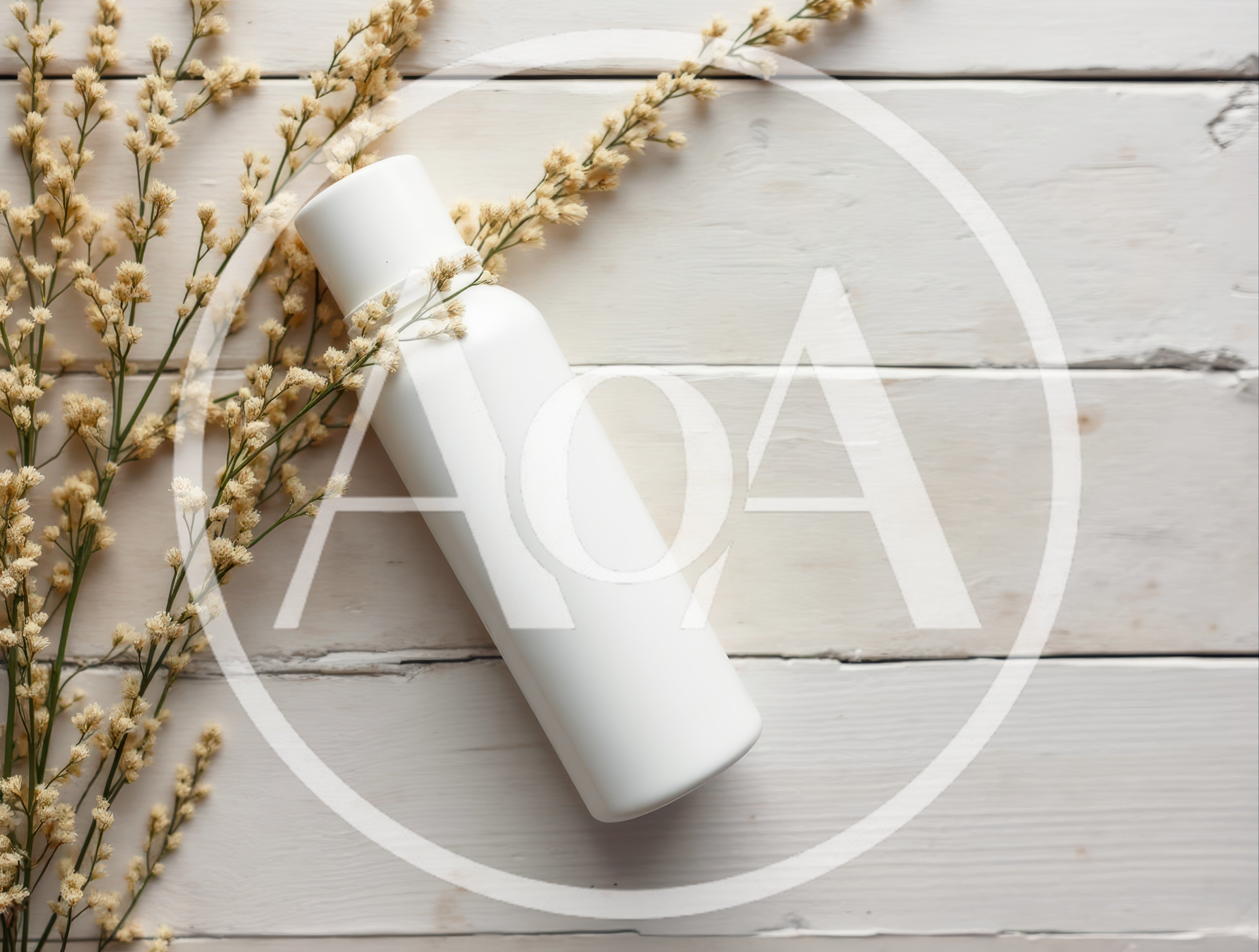 White Cosmetic Bottle With Dried Flowers On Wooden Background