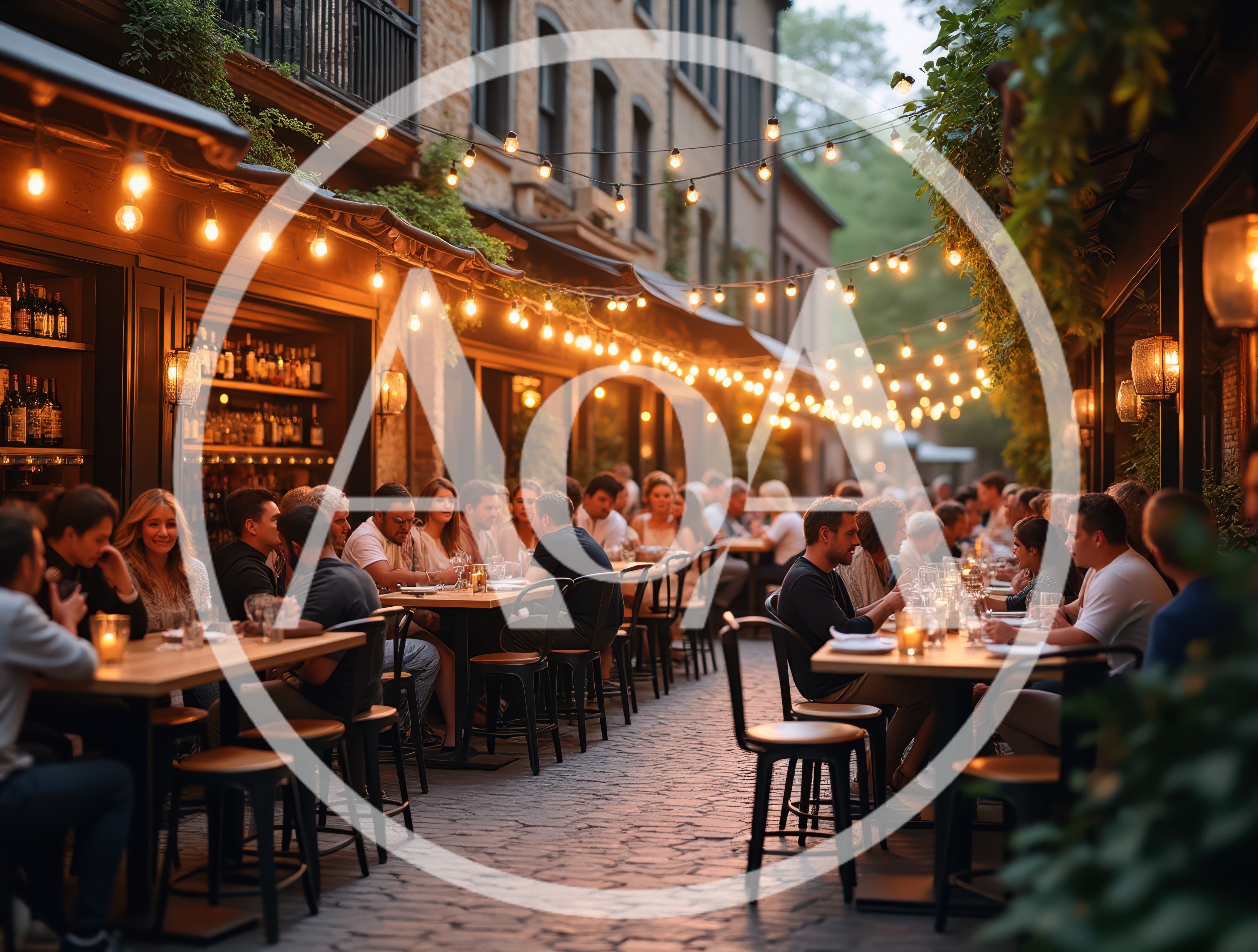 People Dining At Outdoor Restaurant Tables In Evening