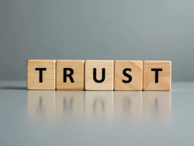 Wooden Blocks Spelling The Word Trust