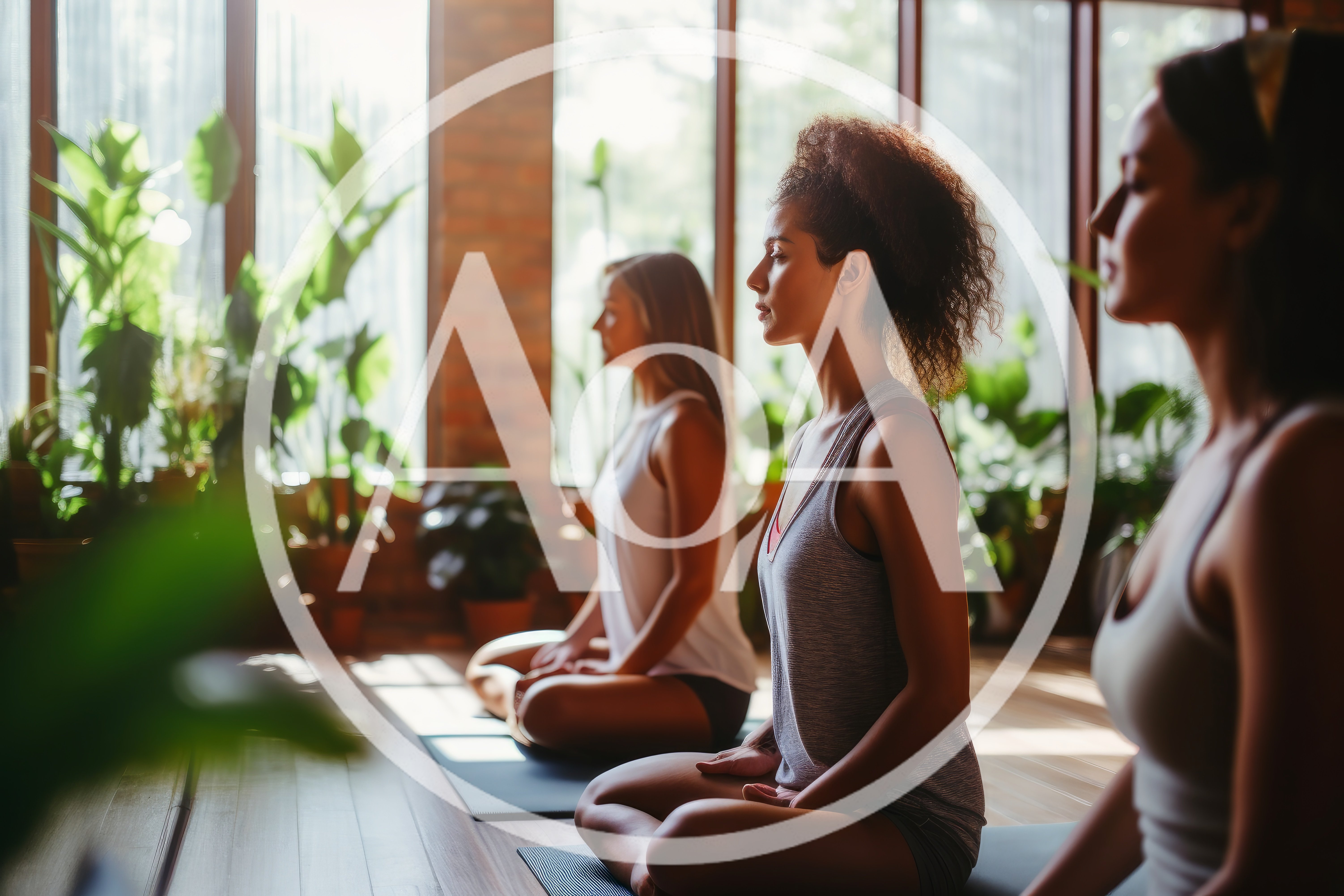Three Women Practicing Yoga Meditation In A Sunny Studio