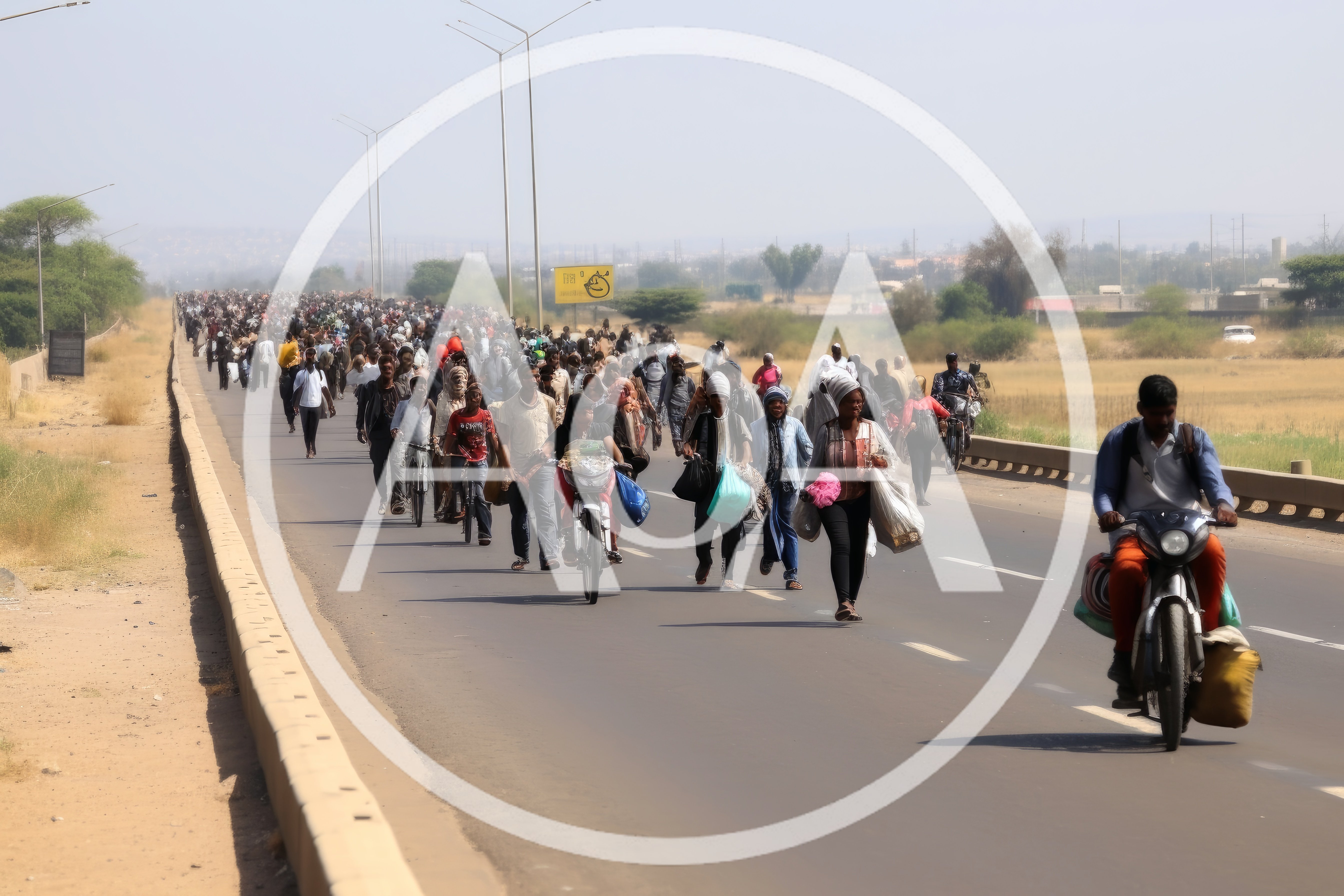 Large Group Of Migrants Walking Along A Highway
