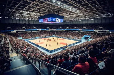 Crowded Indoor Arena During A Basketball Game
