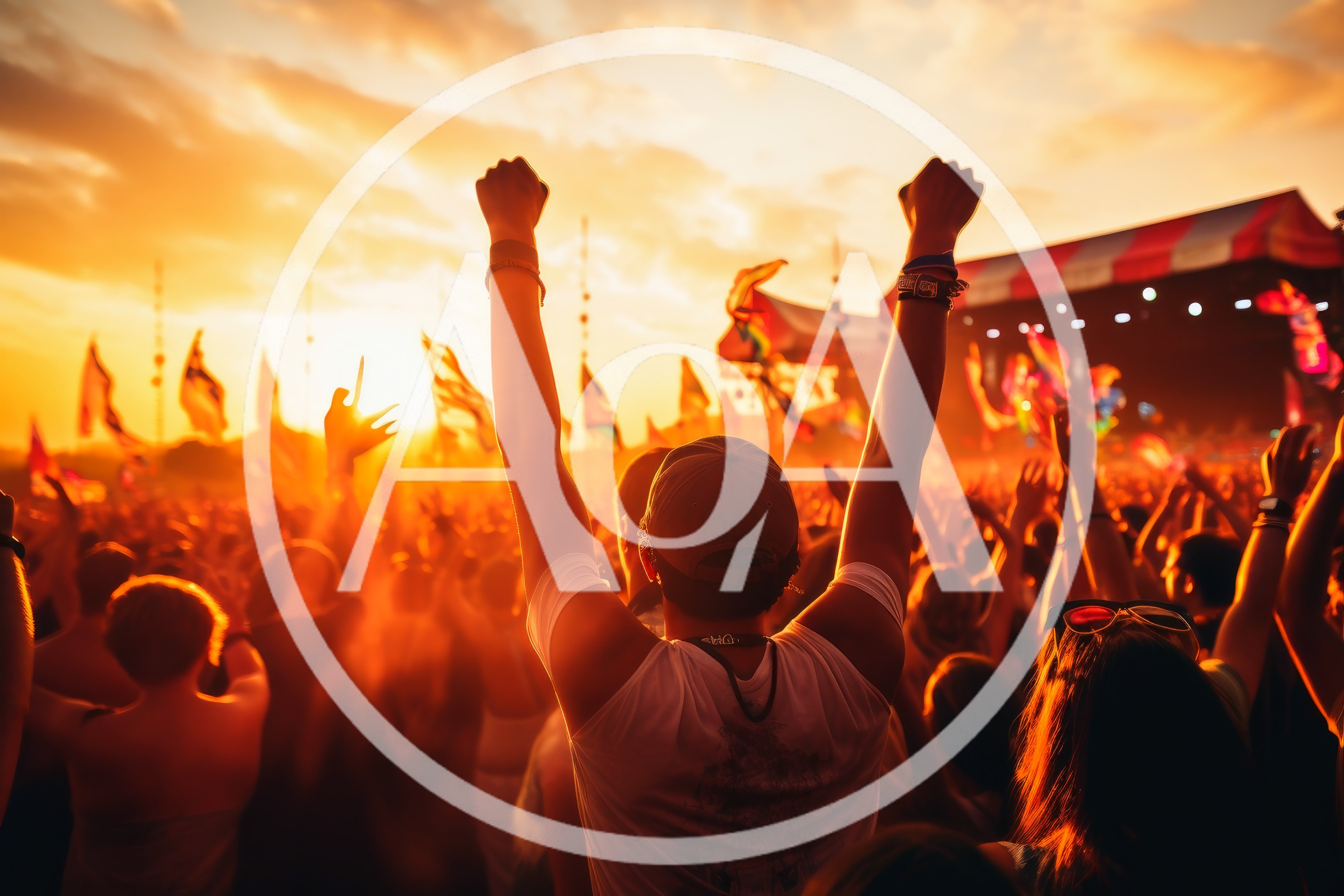 Crowd Celebrating At An Outdoor Music Festival At Sunset