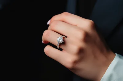 Close Up Of A Woman Wearing A Diamond Ring