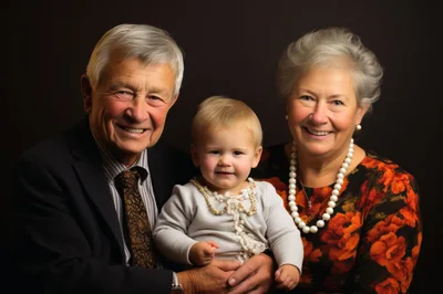 Portrait of Grandparents Holding Their Young Grandchild