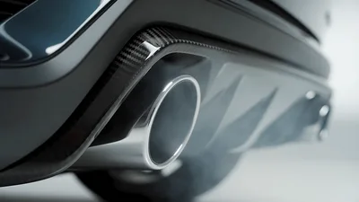 Exhaust Pipe Emitting Smoke From Luxury Sports Car