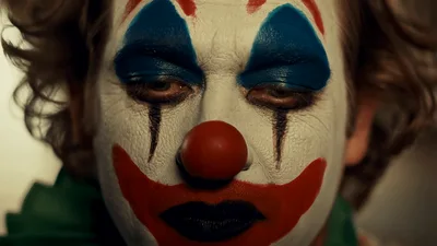 Clown Makeup Man Transitioning From Smiling To Sad Expression