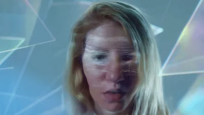 Woman With Digital Facial Recognition Scanning Overlay