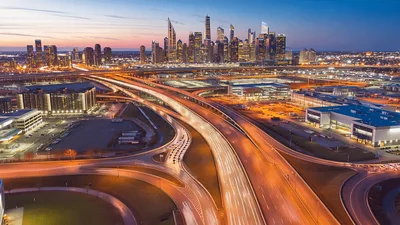 Aerial View Of Busy Highway Interchange At Twilight