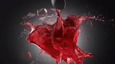 Red Wine Glass Shattering And Splashing In Slow Motion