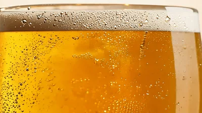 Close Up Of Carbonated Beer In A Glass