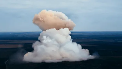 Massive Controlled Explosion Creating Large Mushroom Cloud
