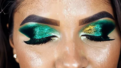 Close Up Of Woman With Dramatic Green Glitter Eyeshadow