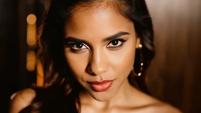 Beautiful Young Woman Smiling At The Camera