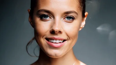 Young Woman Smiling And Pouting At Camera