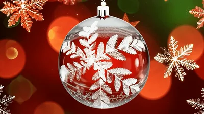 Christmas Ornament With Snowflake Pattern Hanging Against Bokeh Background