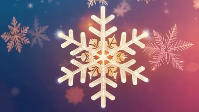 Golden Snowflake Ornament Rotating Against A Festive Background