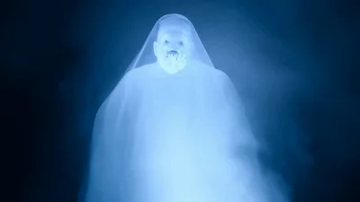 Ethereal Ghostly Figure Floating In Dark Foggy Atmosphere