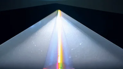 Light Beam Refracting Through A Glass Prism