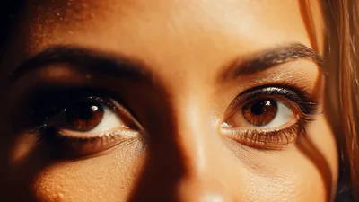 Close Up Of A Woman Opening Her Brown Eyes