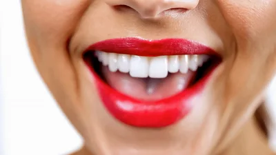 Woman With Red Lipstick Smiling And Pouting Lips