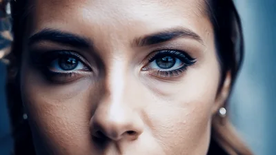 Close Up Portrait Of A Woman With Intense Gaze