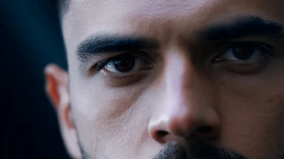Close Up Portrait Of A Serious Man Staring