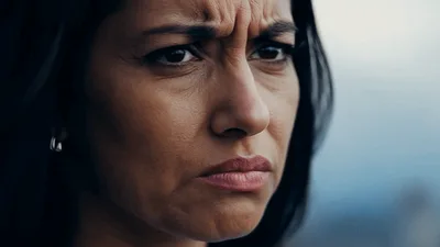 Close Up Of A Woman Looking Concerned And Sad