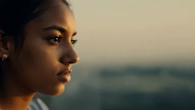 Young Indian Woman Looking Into The Distance