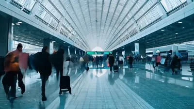 Time Lapse Of Busy Airport Terminal Corridor